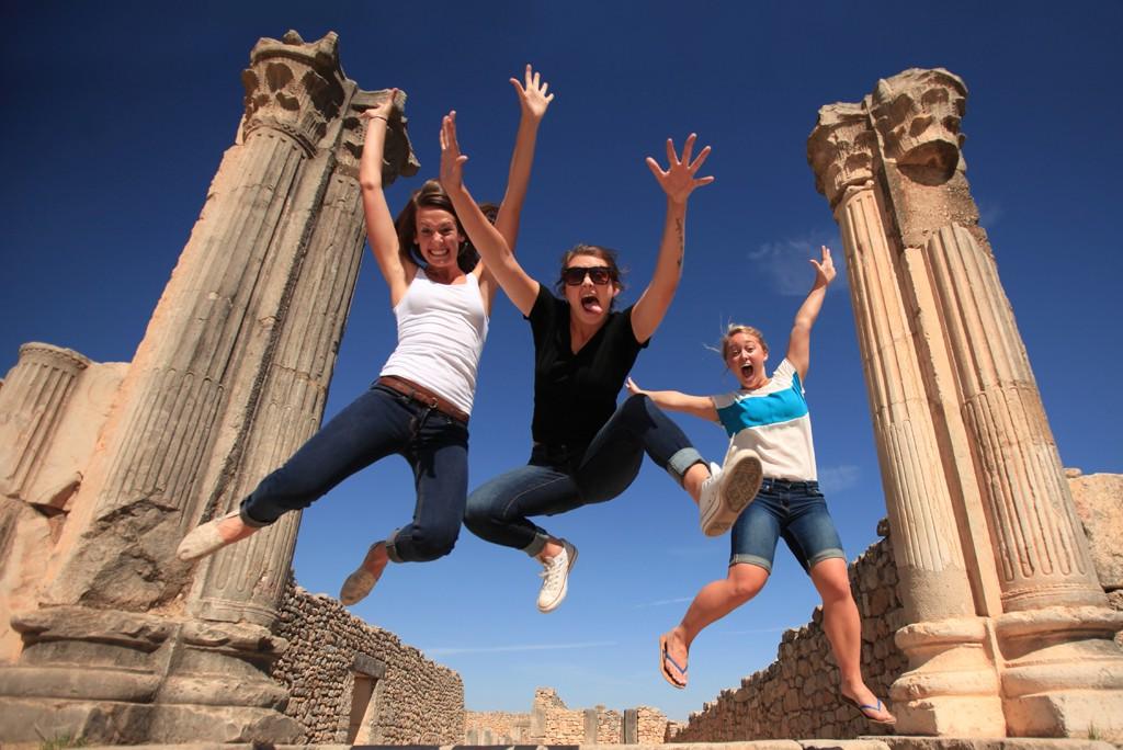 college students at roman ruins in 摩洛哥